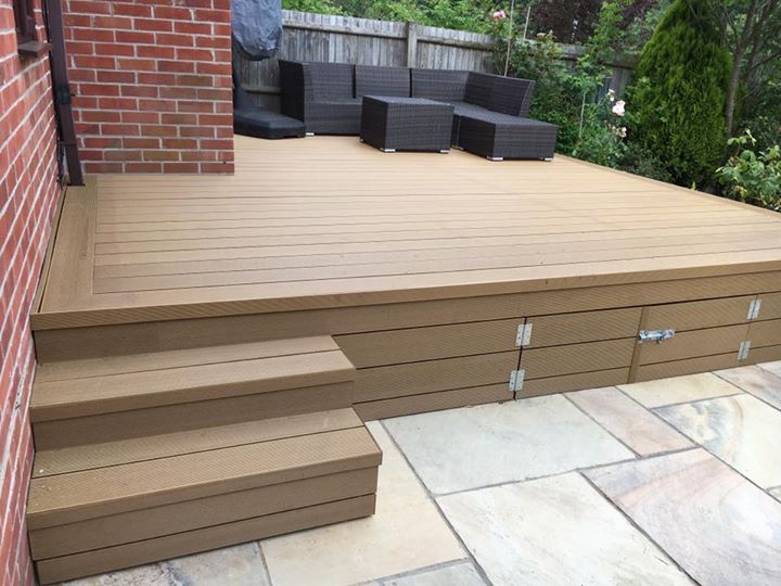 new raised composite decking project with underneath storage with a fossil buf